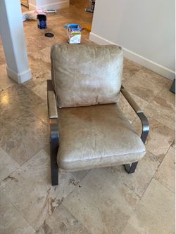 Leather and steel chair.