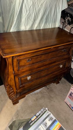 Wood Dresser with Carved Details and 3 Drawers