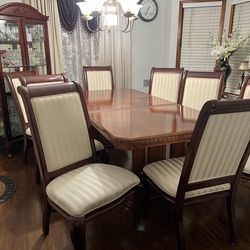 8 chairs dinning set it has extension to fit the 8 chairs