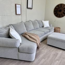 WE DELIVER! 🚚 - Jordan’s Furniture Light Gray Modern Deep-Seated Sectional L Couch with Cuddle Corner & Ottoman Set