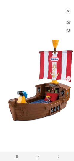 Little Tikes pirate ship toddler bed with toy storage and lights