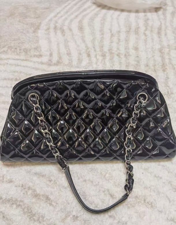 Chanel black patent leather dumpling bag