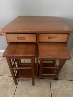 3-Piece set space saver drop leaf dinning set with wheels . Compact storage drawer and 2 stools . It’s available as long as you can see this post. Win
