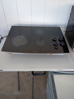 Whirlpool,  Electric Stove. 30"3/8 Long Size         22"1/8 Short Size