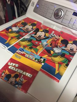 $8 3 Mickey Mouse table clothes 1 pack of 8 goody bags