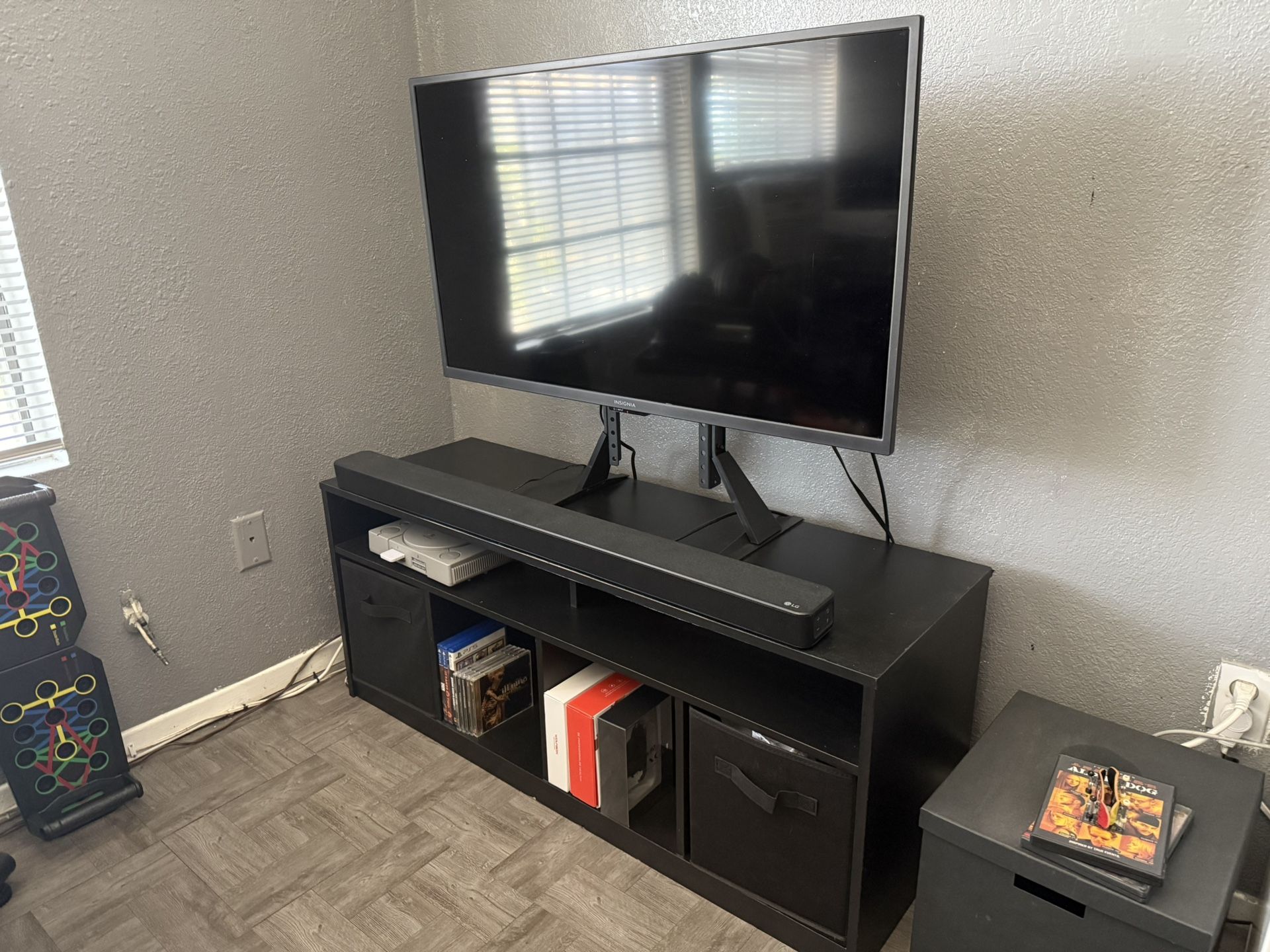 Tv stand and 32” insignia TV