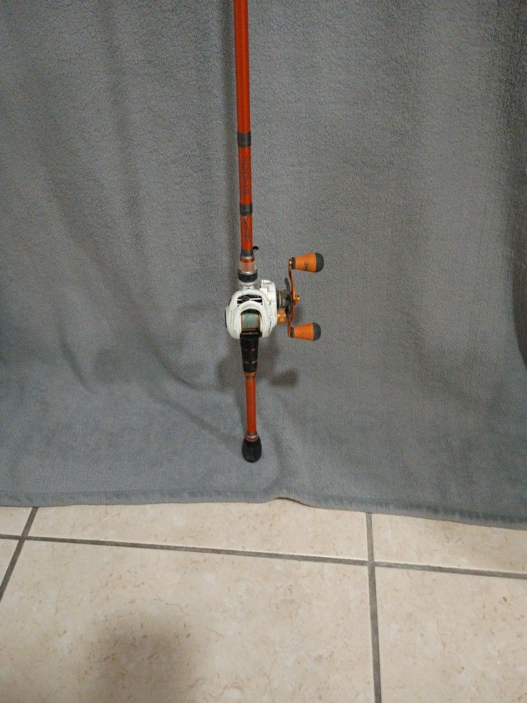Tsunami TSCS701MH spinning Rod. 7'. With Lews Xfinity Speed Spool. Xfish Reel