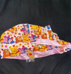 Winnie the Pooh Scrub Cap with Badge Reel