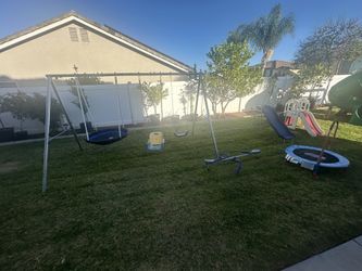 Toddler swingset, trampoline, and slides