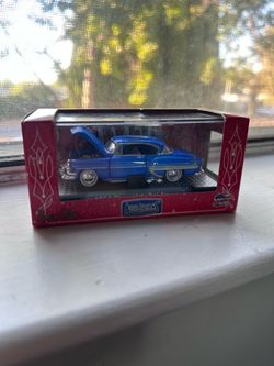 1954 Chevrolet Bel Air is a 1:64 scale collectible diecast model