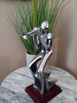 Herco 12" Silver Trumpet Player Sculpture Figurine on a Wooden Base. A couple small Scuffs