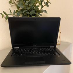 Dell 14 inch screen with 256 GB SSD 5th Gen i7 Quad Core