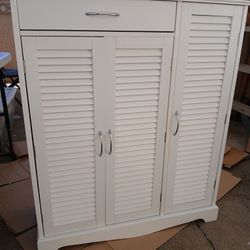 Freestanding Shoe Cabinet: This freestanding shoe cabinet measures 33.5"W x 14.75"D x 393"H, providing a compact solution to keep your shoes organized