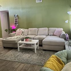 Beige double sectional couch