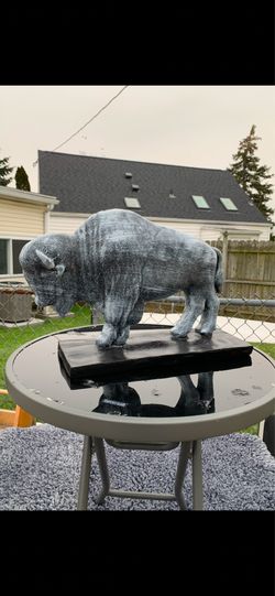 The old gray buffalo statue