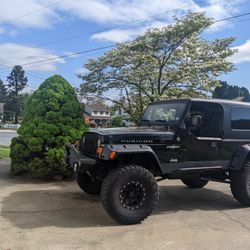 (LJ) 2006 JEEP WRANGLER UNLIMITED ROCK SLIDERS/ GUARD 