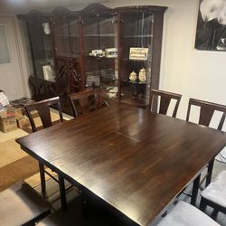 dining set table with 8 chairs  Dementions are 54x 54 with leaf