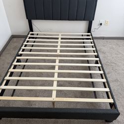 Bed frame new in box Queen size