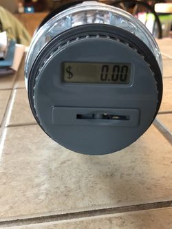 Bank with LCD screen on lid