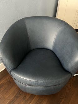 All leather swivel bucket chair