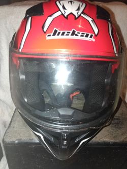 Juckai full faced motorcycle helmet. Used in very good condition. All inner helmet parts included. Size L.
