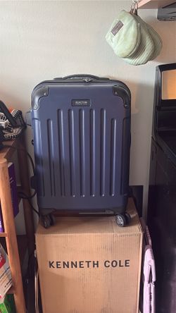 Brand  new Keneth Cole carry on suitcase