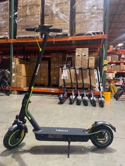 Electric scooter with front and rear shock-absorbing large tires