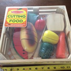 Brand new Melissa and Doug cutting food