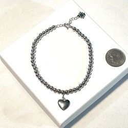 Brand new .925 silver bead strand bracelet with silver heart pendant