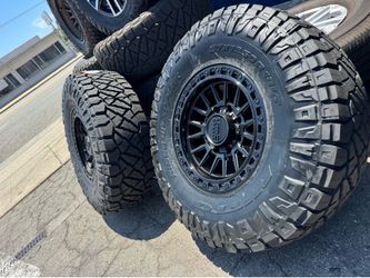 KMC KM557 Matte Black Gloss Black Lip 18x9 8x180 Offset 0 + Nitto Ridge Grappler 37x12.50R18 | Installed Bundle Deal