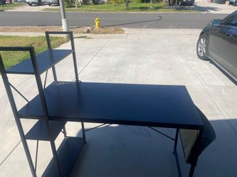Computer desk with storage and outlet
