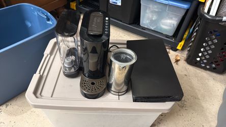 Verissmo espresso machine with frother and storage tray