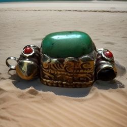 Vintage & Stunning Hand Carved  Tibetan Green Turquoise pendant set in silver 10grams