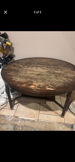 Round wood and metal table Round wood and metal table