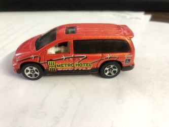 Loose Hot Wheel Dodge Caravan, Color: Orange.