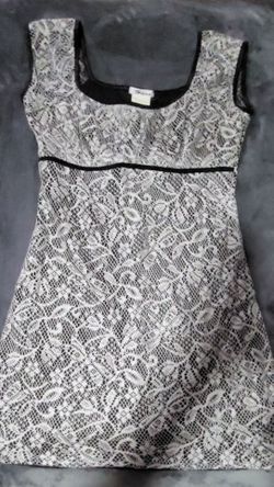 Cute black lacey dress.
