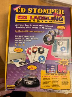 CD Stomper with extras (refills, labels, exacto knife idk)