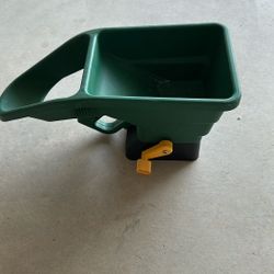 Handheld Fertilizer Dispenser. 