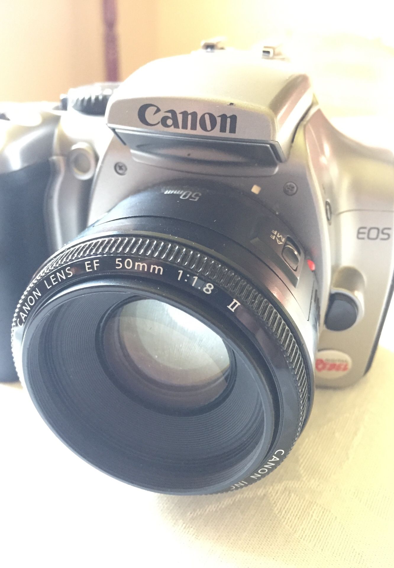 Canon EOS Digital Rebel camera with EF 50mm lens 1:1.8 II, battery and card