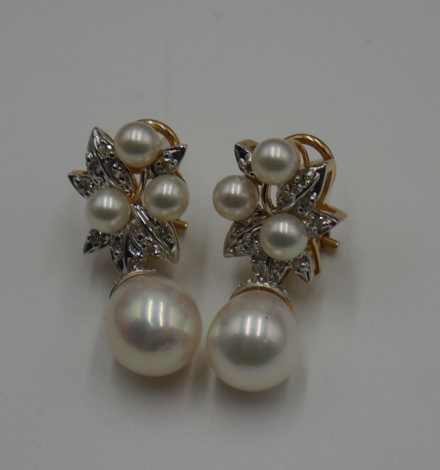 14KT YELLOW GOLD PEARL EARRINGS 7.3 GRAMS WITH  0.25 PTS OF DIAMONDS. 870142-2.  