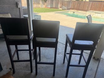 3 wooden barstools