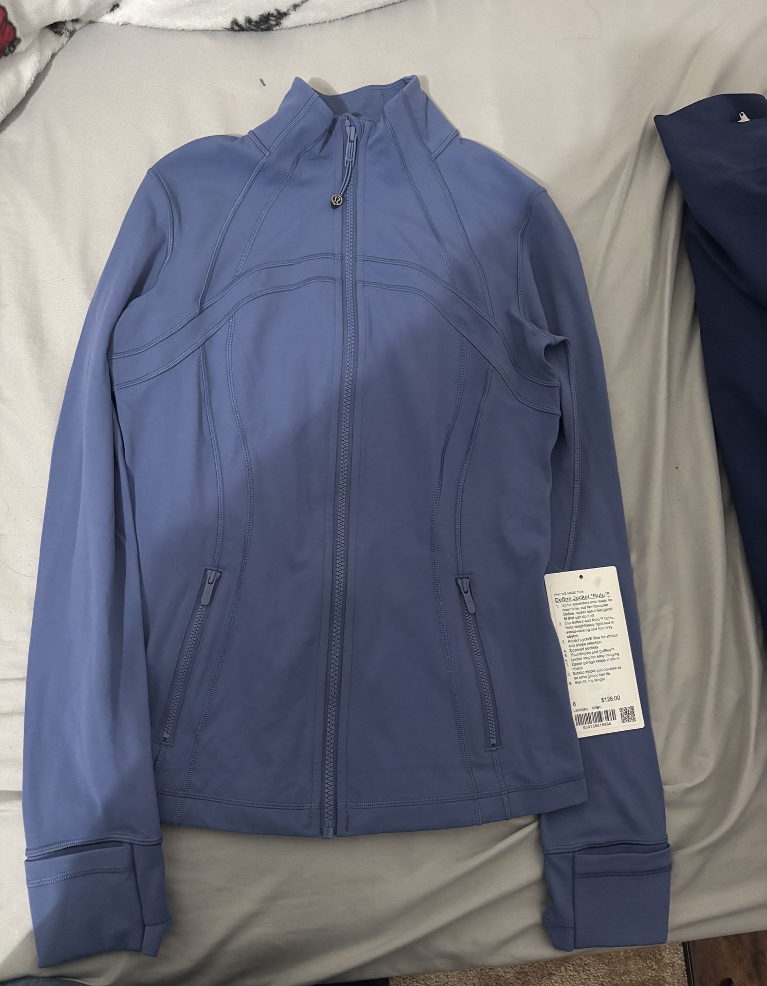 Lululemon (light blue jacket)