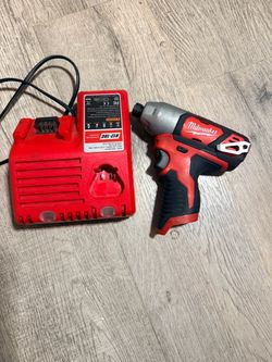 Milwaukee drill and charger