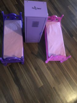 Doll beds 18” purple and pink $20 doll locker purple Emily Rose $15 great for American girl dolls or other brands hardly used will meet in public pla