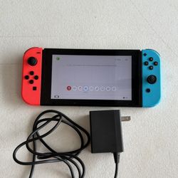 Nintendo Switch HAC-001 Console system with charger Only.