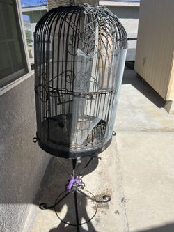 vintage, black wrought iron bird cage,