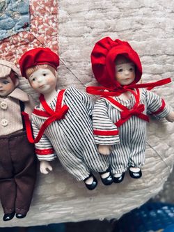 Porcelain Miniature Dolls with Red Hats