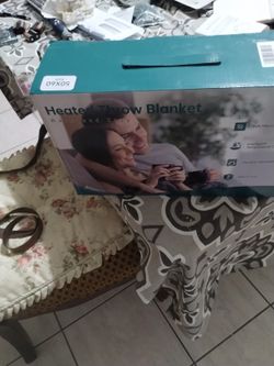 NEW HEATED THROW BLANKET 