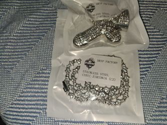 Stainless steel necklace and cross iced out