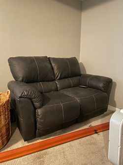 Black Pleather Reclining Sofa – $330